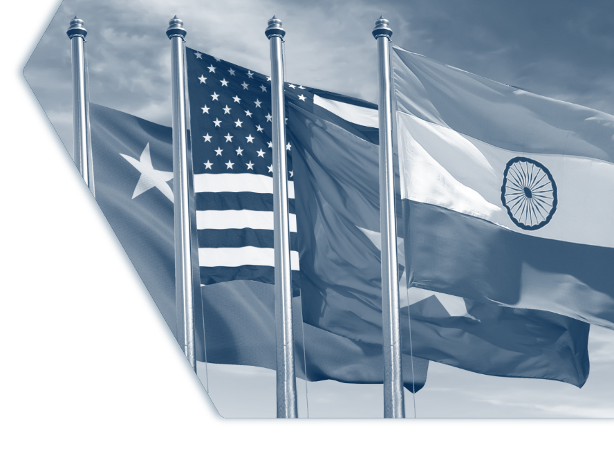 Flags waving to the wind with sky in the background