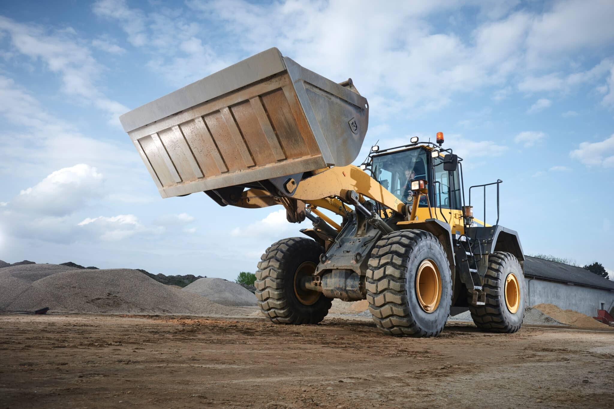 tractors pushing dirt